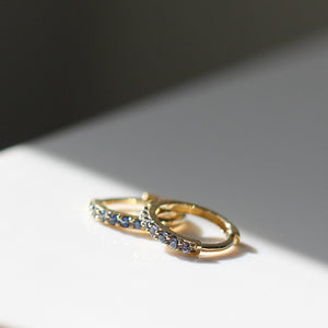Blue Sapphire Gold Hoops stacked in light side view