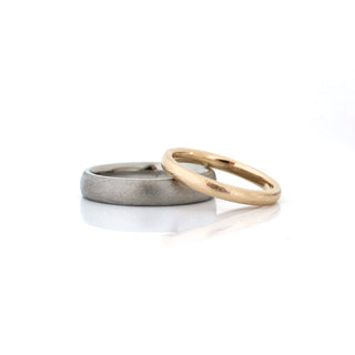 Classic Textured Wide Band in white gold stacked with a thin textured yellow gold band 