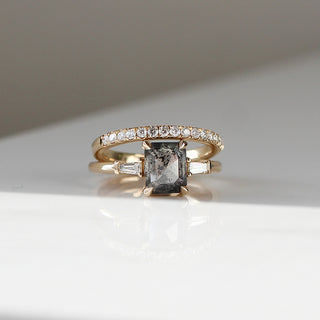 Emerald shape diamond ring with diamond band