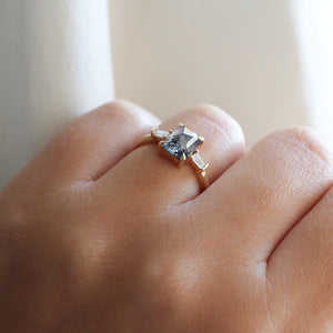 Emerald shape diamond ring on hand side view