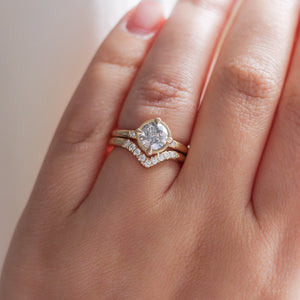 Diamond Point Gold Band stacked with round diamond ring on hand