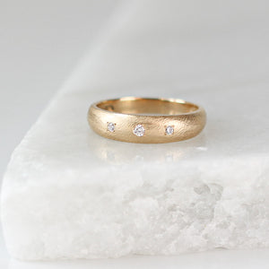 Dome Textured Diamond Band on marble  