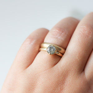 Textured Edge Gold Band stacked with round diamond ring on hand