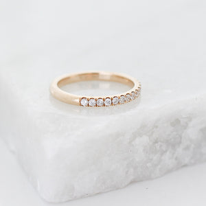 Diamond Pave Gold Band on marble quarter view