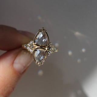 Double Pear Diamond Ring in hand 