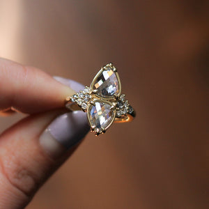Double Pear Diamond Ring in hand 