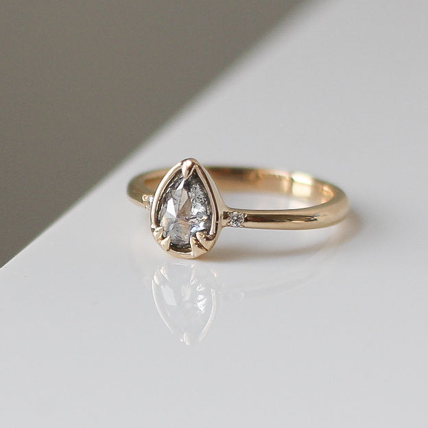 Pear diamond ring in yellow gold front view