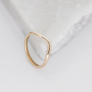 Wave Gold Band on marble profile view 