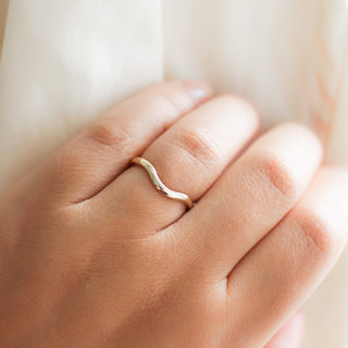 Wave Band in Yellow Gold on hand 