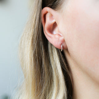 Diamond Hoops in Yellow Gold worn on ear