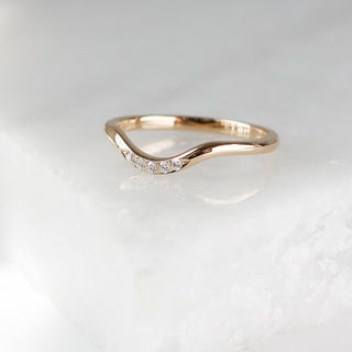 5-stone Diamond Wave Band on marble quarter view