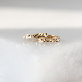 Clara Diamond Cut Hoops stacked detail side view on marble