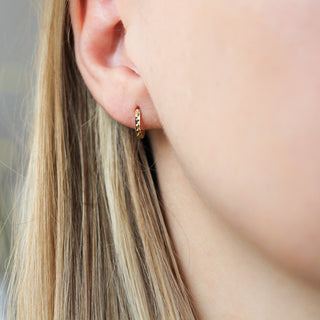 Clara Diamond Cut Gold Hoops being worn 