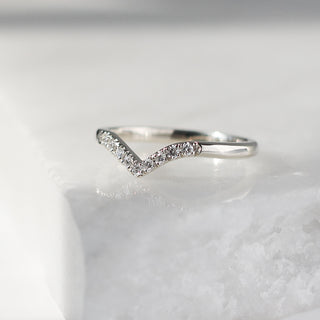 Diamond Point Band in white gold on marble quarter view