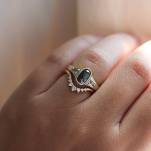Sahara Diamond v shaped band stacked with oval black diamond ring on hand