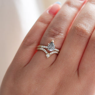 V Shaped Diamond Point Band stacked with pear diamond ring on hand