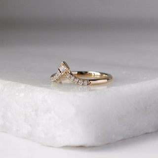 V Shaped Diamond Point Band quarter view on marble