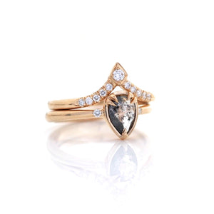 Kite Diamond Point Band stacked with oval salt and pepper diamond ring quarter view