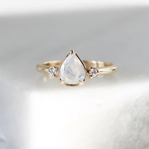 Pear diamond ring on marble