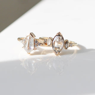 Marquise salt and pepper diamond ring in sunlight group shot