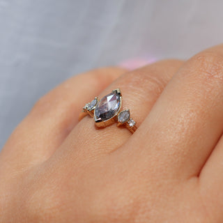 Marquise salt and pepper diamond ring side view on hand