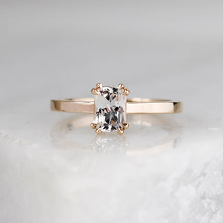 White Sapphire Gold Ring on marble 