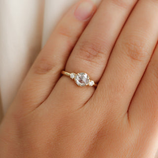 Round rose cut diamond in yellow gold on hand