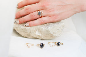 Black Diamond Ring stack on hand on the stone group shot