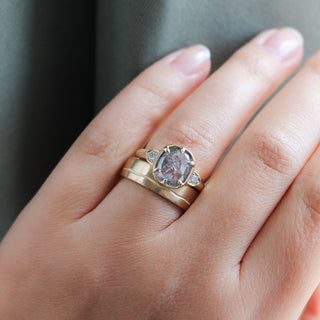Path Gold Wide Band stacked with diamond ring on hand