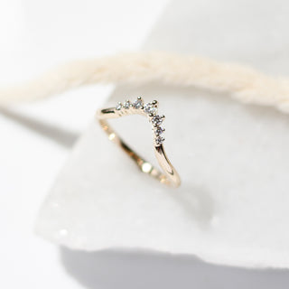 Sahara Diamond v shaped band profile view on marble