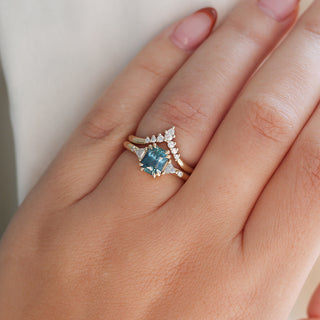 Golden Crown Pear and Round Diamond Ring stacked with sapphire ring on hand