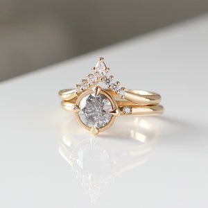 Golden Crown Pear and Round Diamond Ring stacked with Round Diamond Ring quarter view