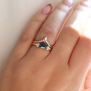 Golden Crown Pear and Round Diamond Ring stacked with sapphire ring on hand 