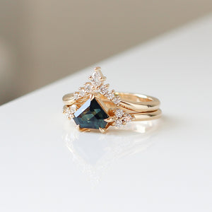 Golden Crown Pear and Round Diamond Ring stacked with sapphire ring quarter view