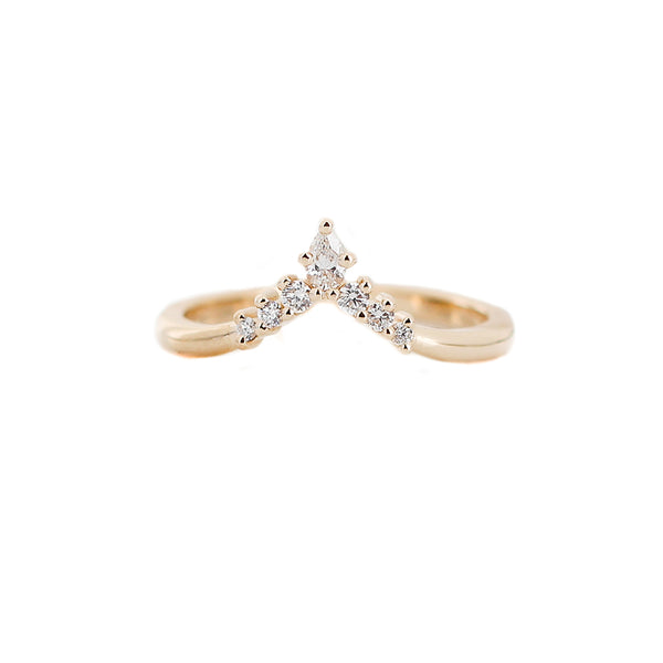 golden crown ring made with pear shaped and round diamonds