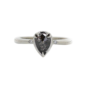 Pear cut black diamond ring in white gold front view