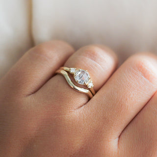 Wave Band in Yellow Gold stacked with diamond ring on hand 